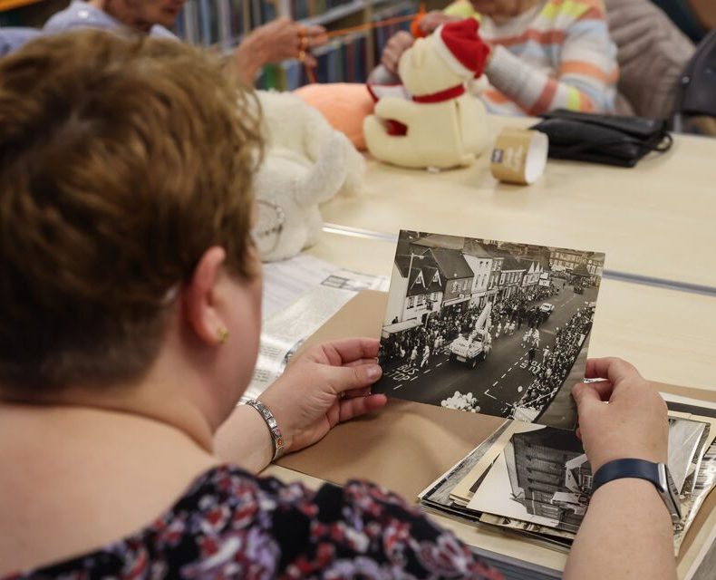 Looking at historical local photographs at Rhymney Library
